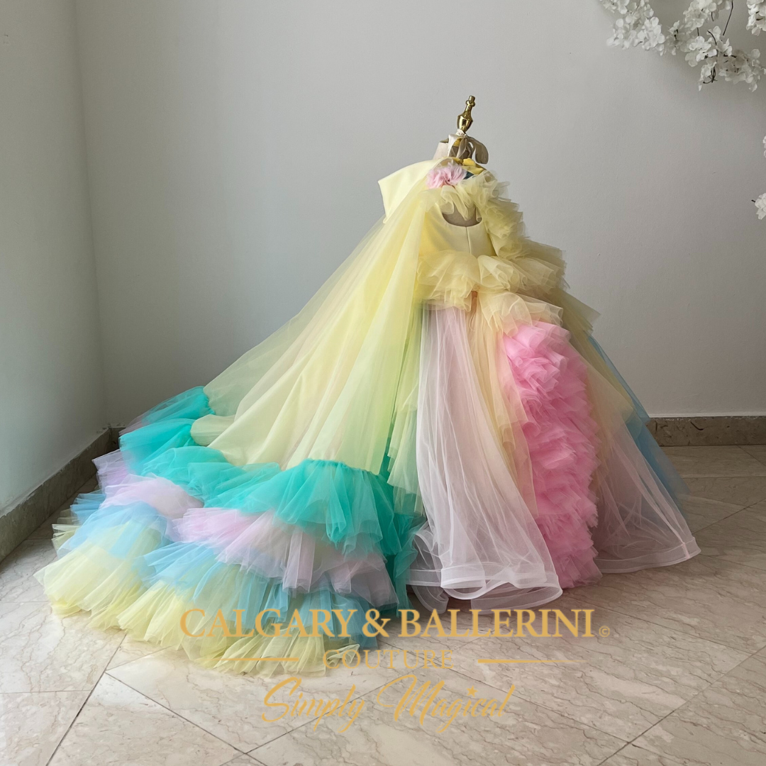 Girls’ princess-style Easter dress with a colorful tulle skirt and ruffled cape