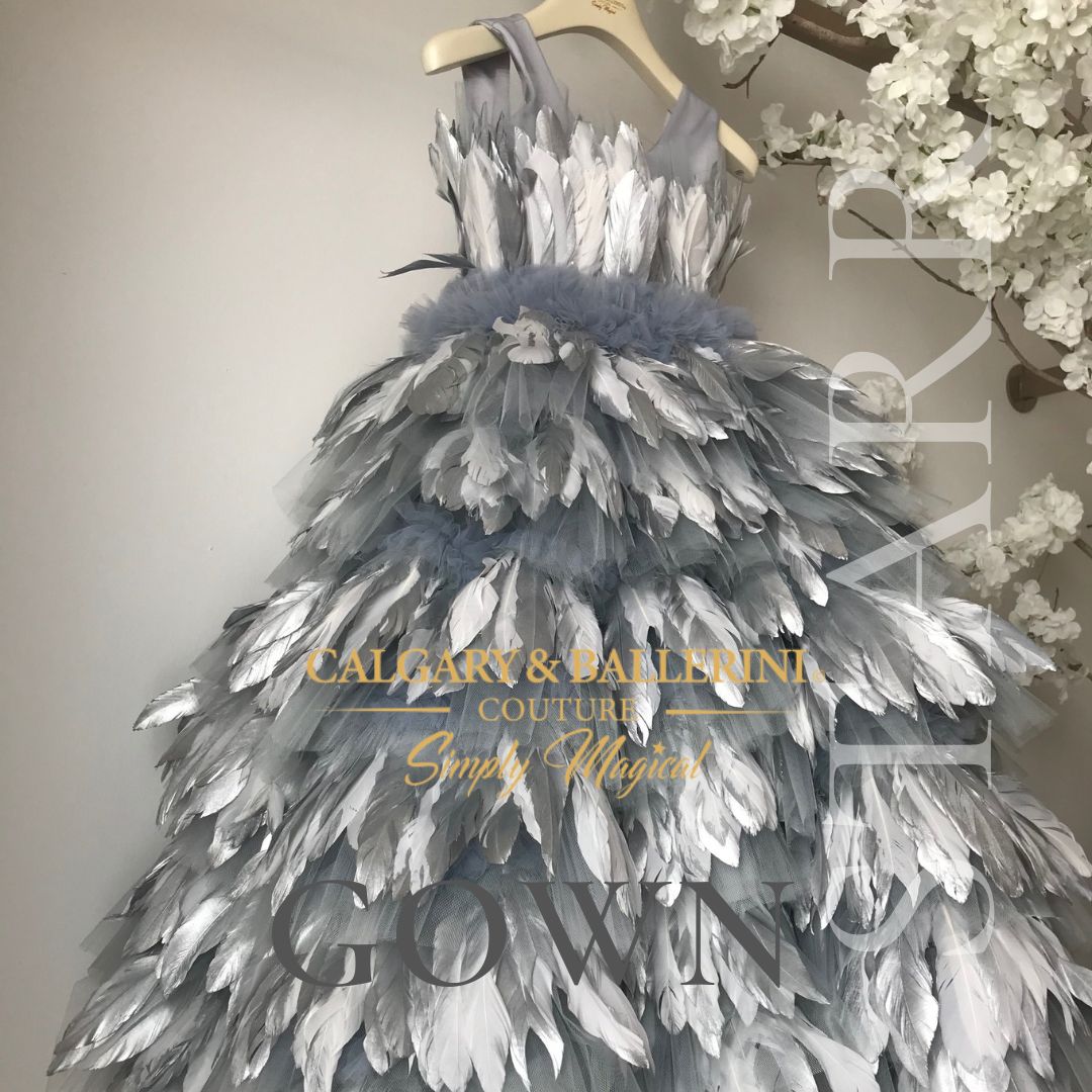 Adult feather dress in silver, available for weddings, quinceañeras, and prom events