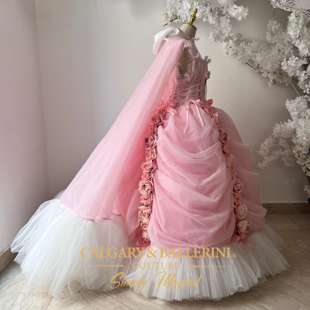 Luxury adult princess costume in pink with stunning roses, a flowing cape, and elegant tulle fabric for women’s costumes