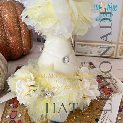 Order our bespoke yellow feather first birthday dress and flower girl dress, a luxury 3D texture masterpiece for lemon-themed parties by Calgary and Ballerini.