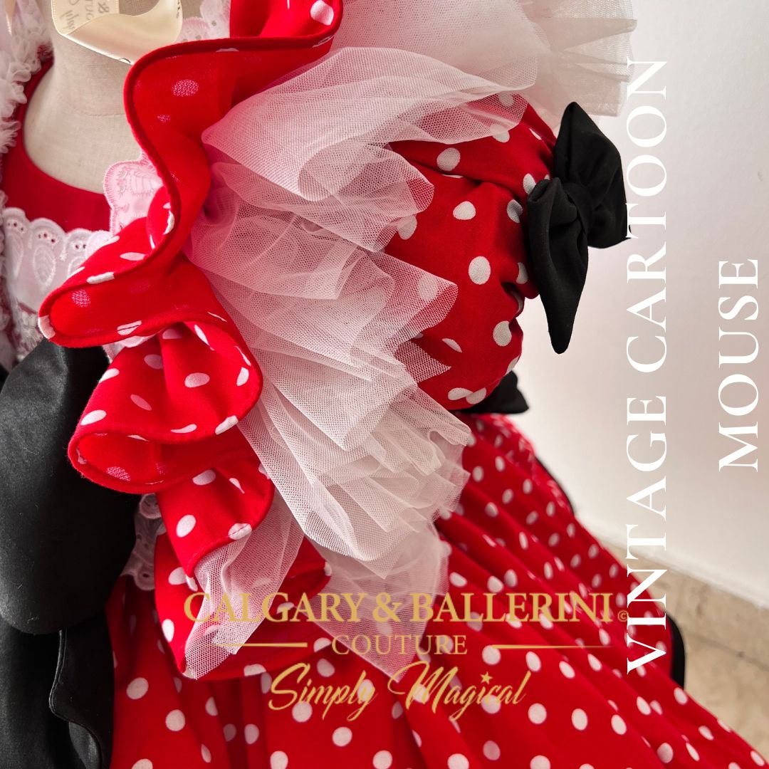 Designer birthday party Minnie polka dot gown with handmade lace detailing and tiered tulle ruffles, luxury red and white princess style dress for toddlers, Calgary and Ballerini artisan couture.