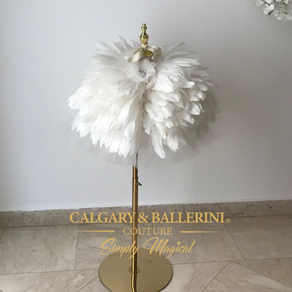 White feather shawl for girls over a Communion dress