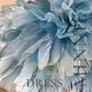 Elegant knee-length blue flower girl dress with pleated bodice