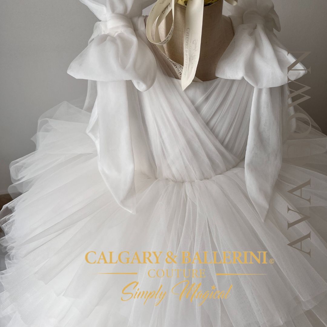 Luxury Catholic First Communion dress with high-low hemline and tulle layers