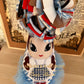 Buy our luxury Dorothy birthday party hat in blue gingham fabric, a showstopping artisan accessory for baby girl milestone photos by Calgary and Ballerini.