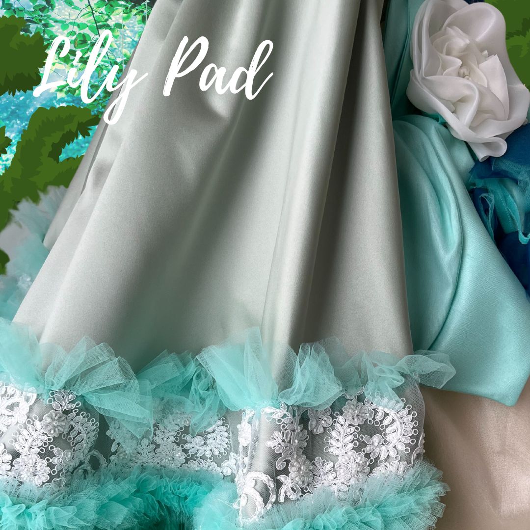 Shop this luxury Tiana princess dress with cape and petals, high-end portrait-grade birthday gown for baby girl and toddler celebrations.