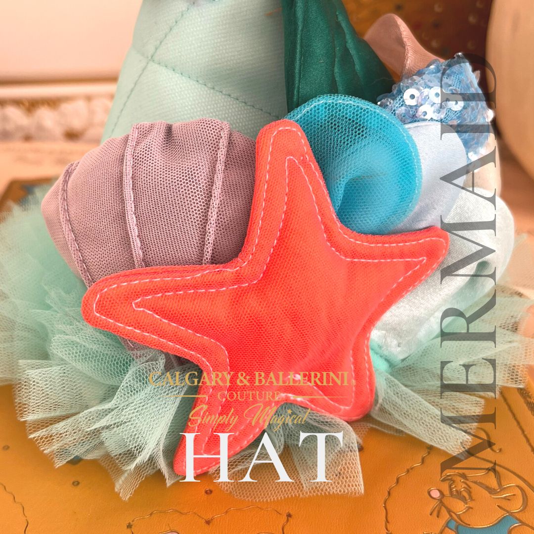 Elegant mermaid party hat featuring pearls and ocean-inspired details