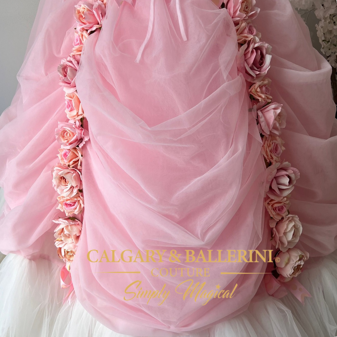 Adult princess dress in pink tulle with Victorian-inspired design, featuring roses and floor-length cape for women’s costumes