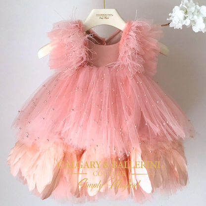 Princess Peach birthday dress for baby girls with pearls and feather trimming.