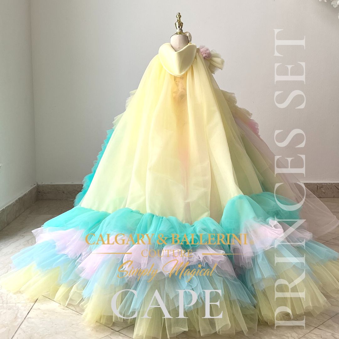 Cape costume shop Easter dress for girls  back view yellow tulle cape with green and blue ruffles 