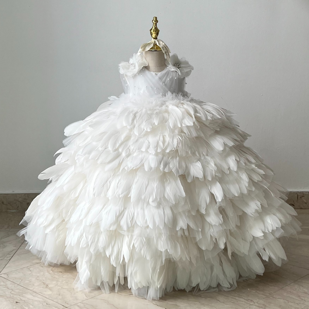 Toddler floor-length feather ball gown in white with genuine goose feathers, designed for weddings and formal events.