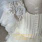 White first communion dresses crafted with luxury materials, offering a sophisticated and traditional style for girls.