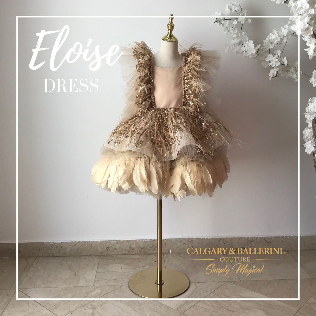 gold feather dress on hanger view 