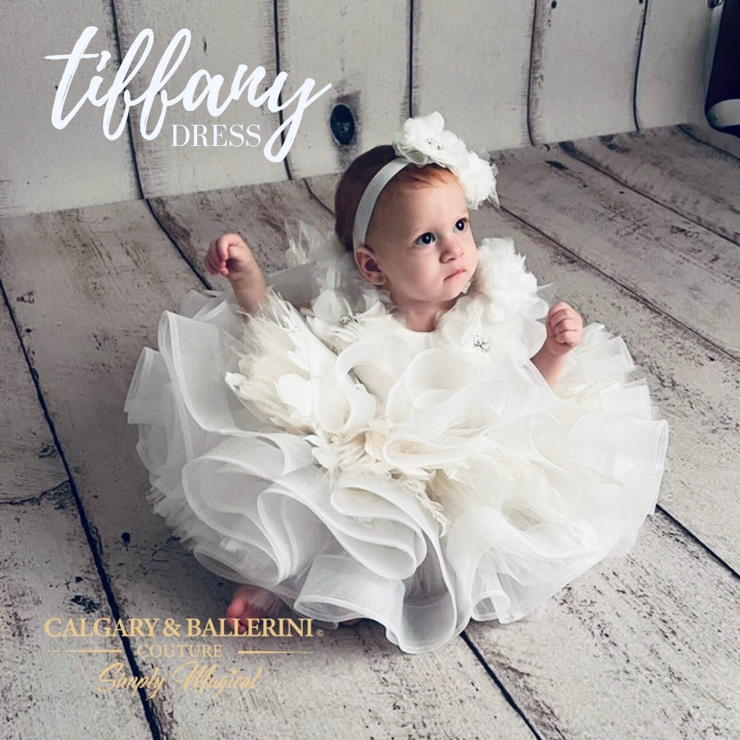 baby flower girl dress on infant model posing at photo shoot 