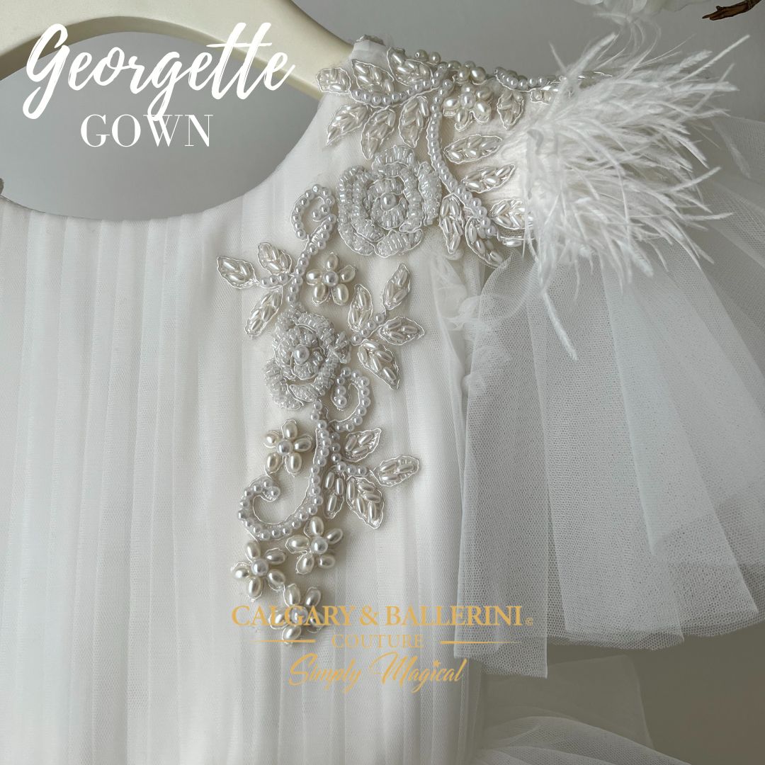 this couture communion dress is the perfect way to make them feel like the star of the show. Don't miss out - get your hands on this stunning communion dress today!