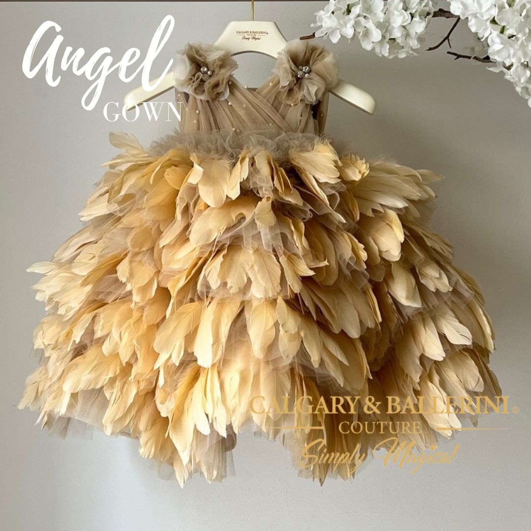 Feather dress for girls. Angel gown is a floor length feather dress with tulle bodice and handmade flowers on either shoulder. The most delicate look ever.