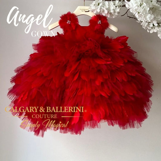 red feather gown on hanger