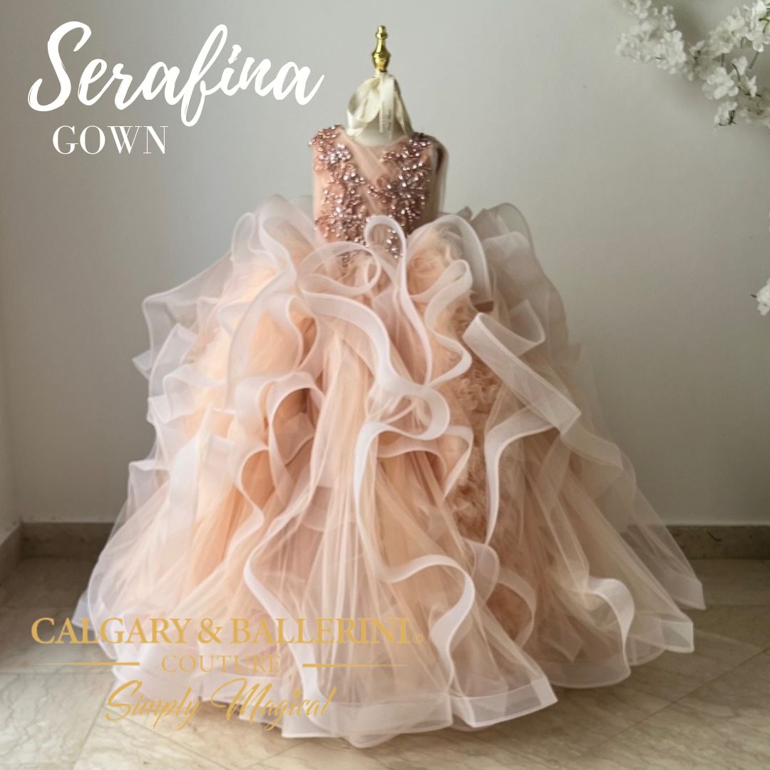 This peach blush ballgown is fit for any princess, and would make an excellent flower girl dress for weddings and 10th birthday celebrations.