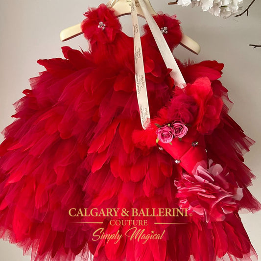 red dress with feather trim