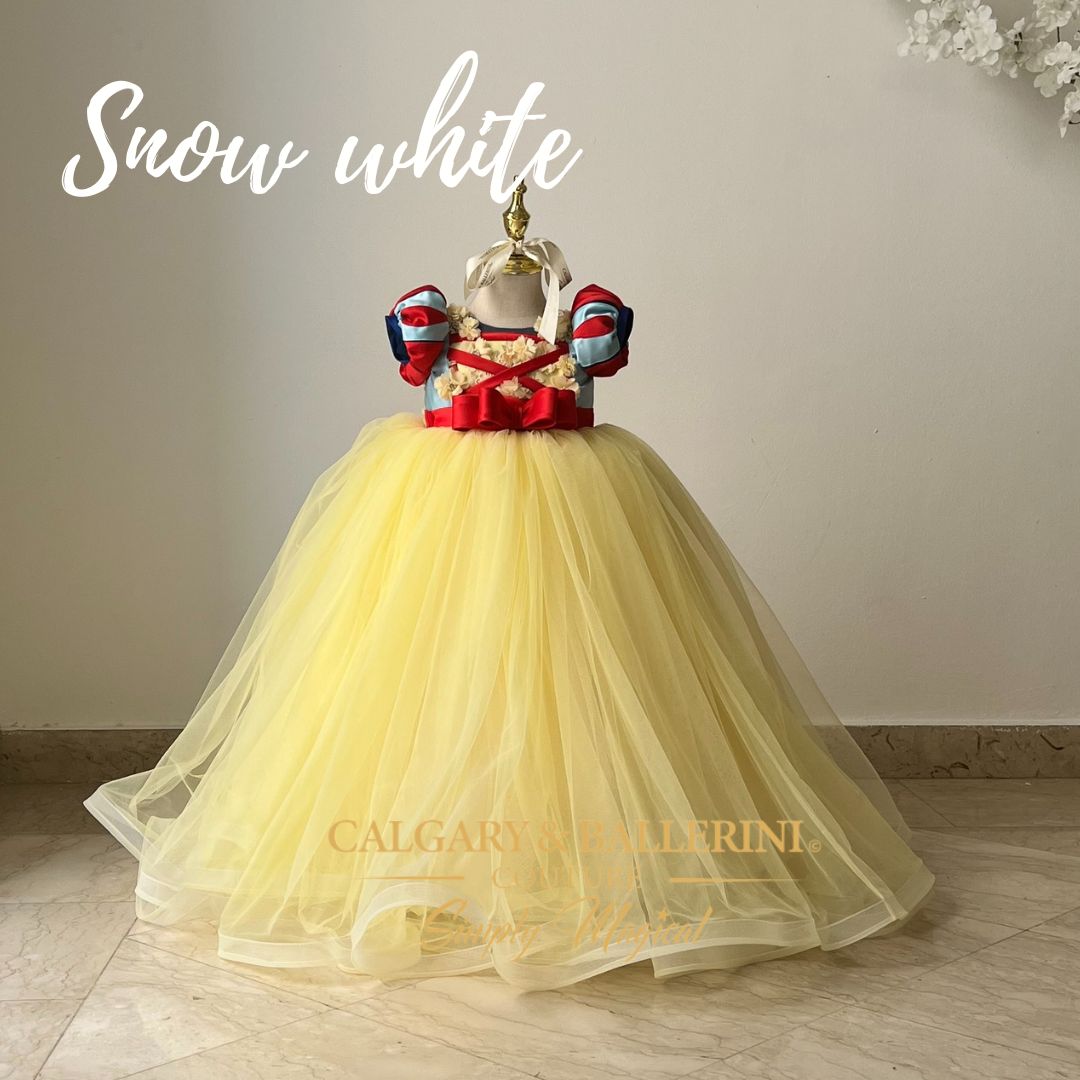 shop Designer Calgary and Ballerini Snow White cottage gown for ages 1–10 years featuring hand-crafted luxury tulle and satin.