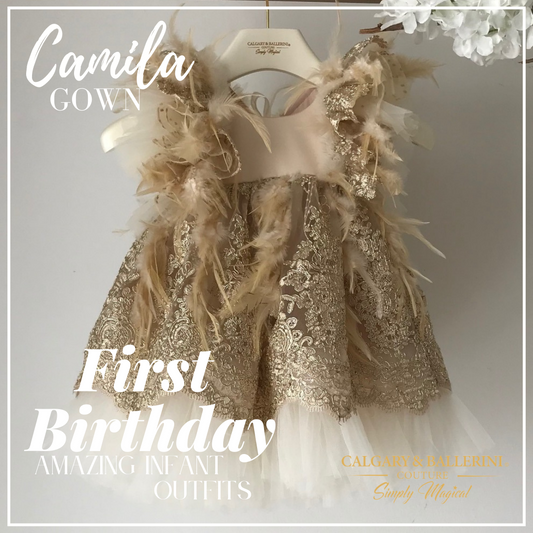 Gold is the traditional first birthday dress color and there is no better gold dress than our Camila gown! Crafted out of golden-fawn tulle, gold lace details and a divine goos feather trim, this gorgeous gown is perfect for turning any occasion into a royal event. Every little girl will be the star of the show in this exquisite 