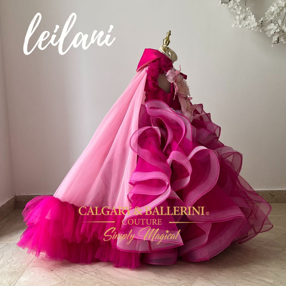 The pink Willow gown in Cherry Blossom is the perfect pageant dress or 10th birthday dress for your daughter. With over 200 yards of horse hair braid and hand made pink flowers and feathers, she will feel like a princess.