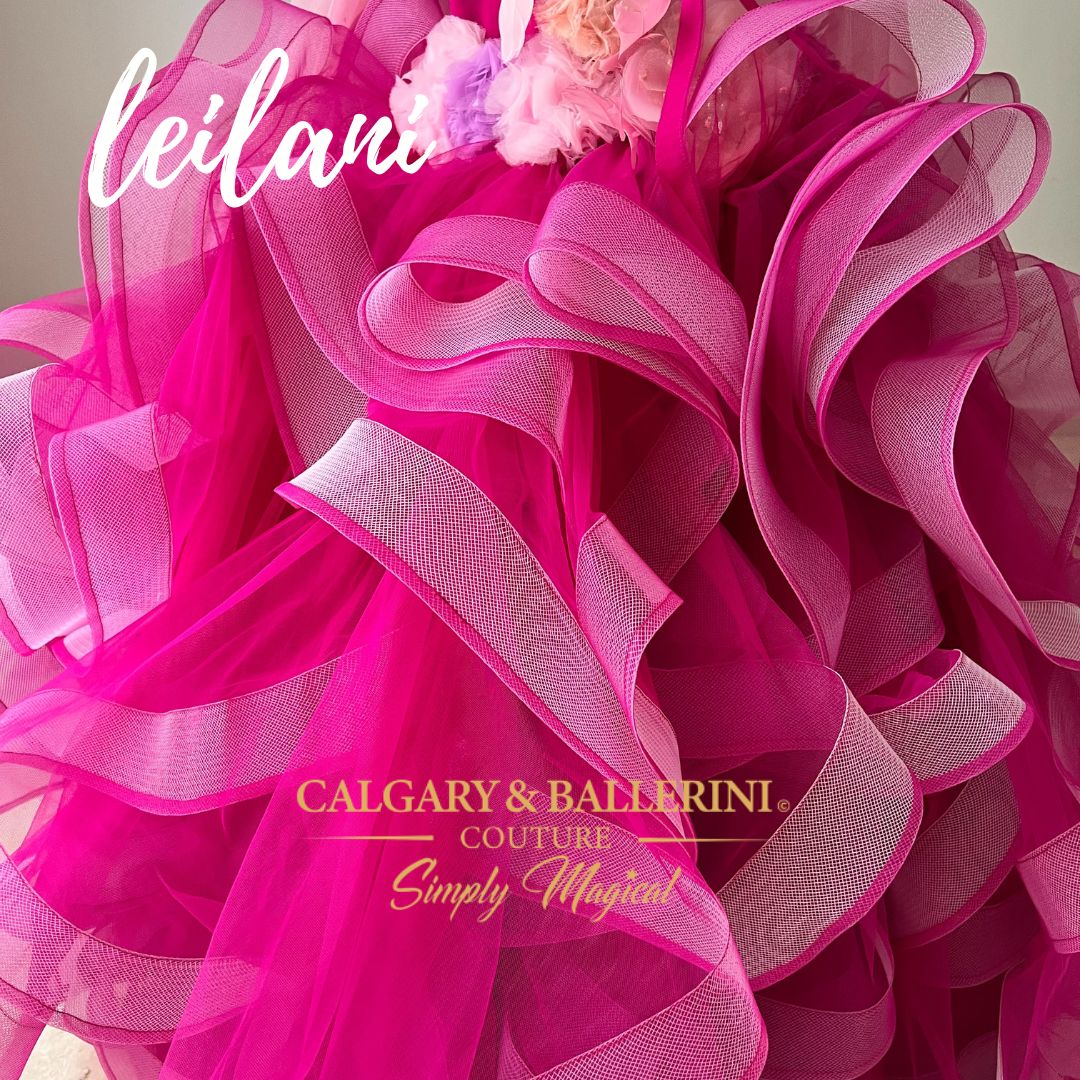This pink dress is the perfect 10th birthday dress. It is a couture flower girl dress with hand made pink flowers and feathers. The full ruffle skirt will make your daughter feel like a princess.