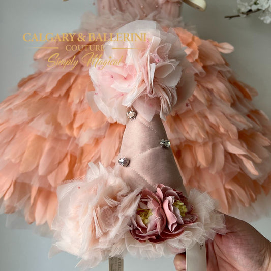 Where to buy a custom birthday party hat? Celebrate in style with a custom handmade peach blush birthday party hat from Calgary and Ballerini. This adorable hat is perfect for any first birthday celebration!