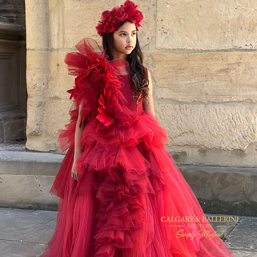 tween posing in red flower girl dresses
