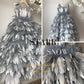 Silver color wedding dress with feathers, a unique alternative to traditional bridal gowns