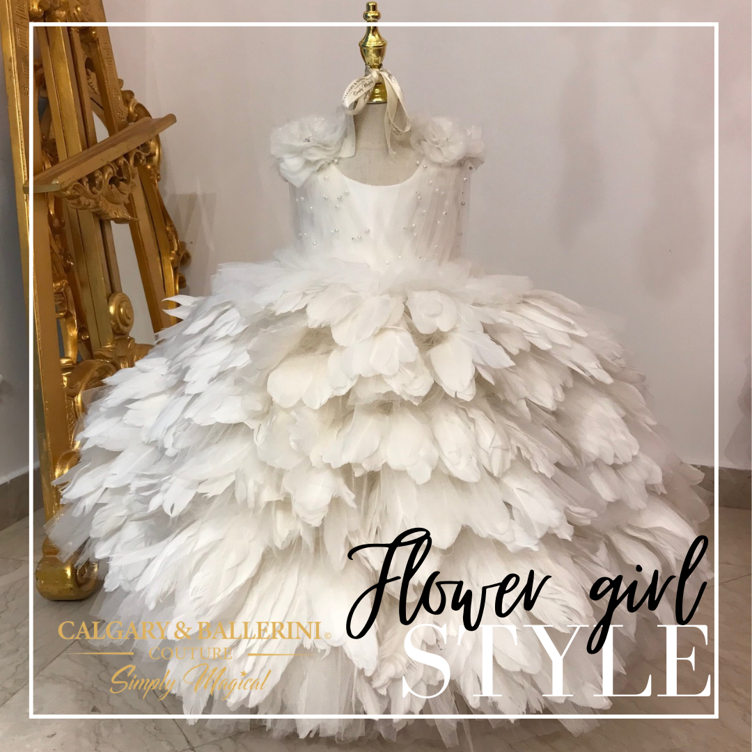 Elegant white feather gown for girls, designed for special occasions, weddings, and flower girl dresses.